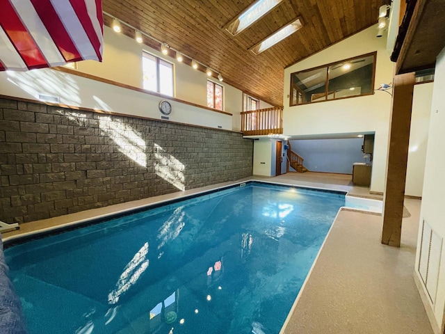 view of pool with a skylight