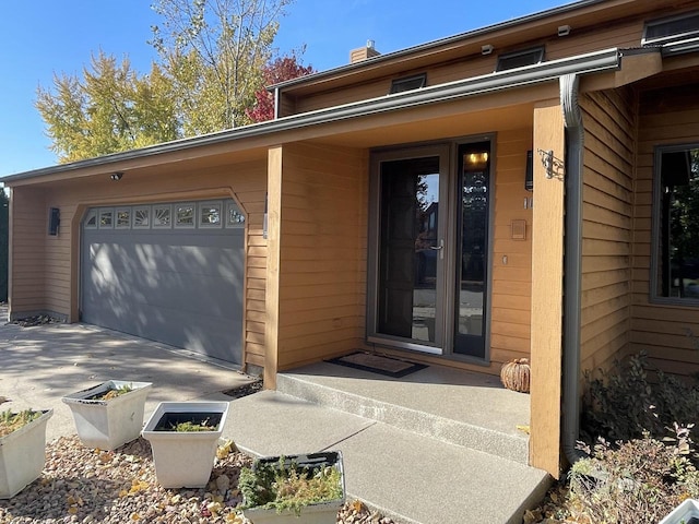 entrance to property with a garage