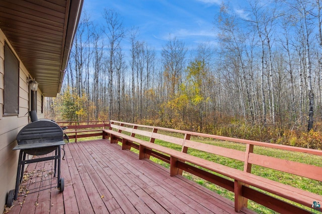 wooden deck with grilling area