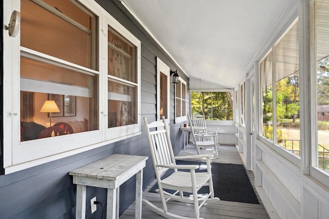 sunroom with vaulted ceiling