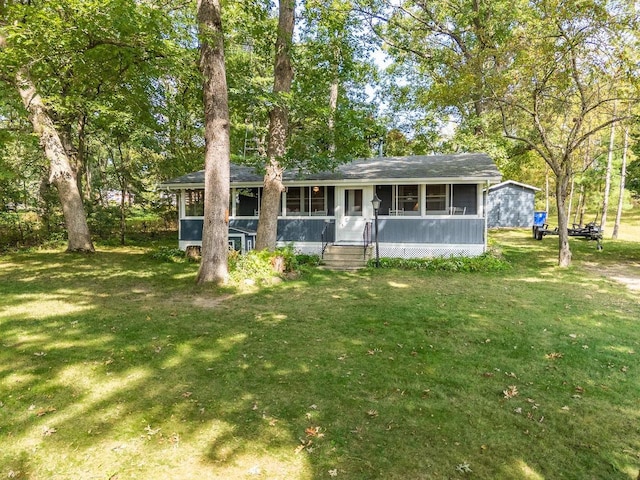 ranch-style house with a front yard