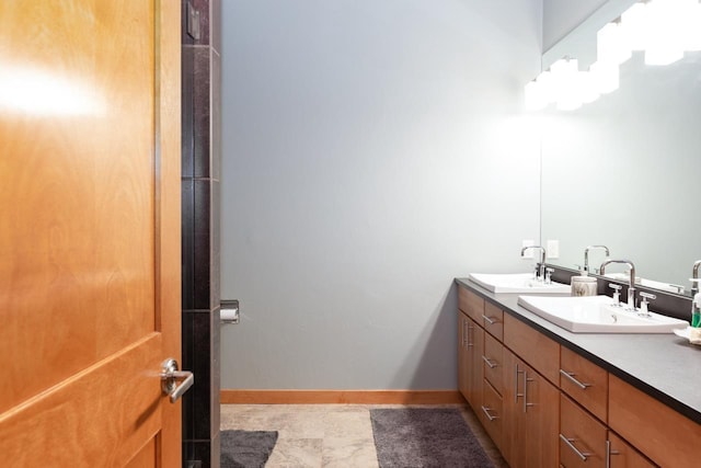 bathroom featuring vanity and tile patterned flooring