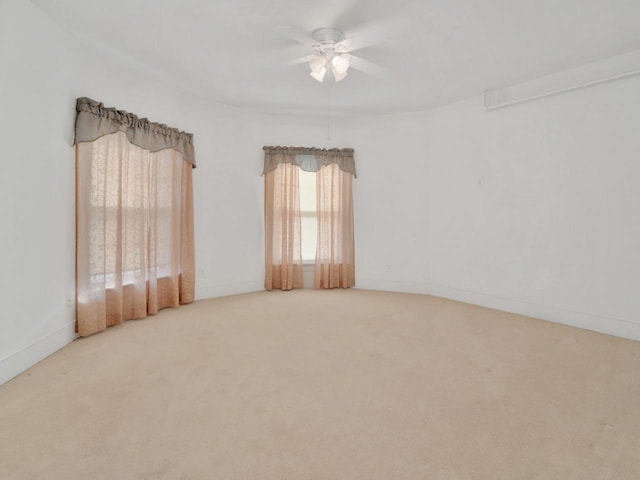 360 1st St, Menasha, WI 54952 - empty room featuring a ceiling fan and carpet