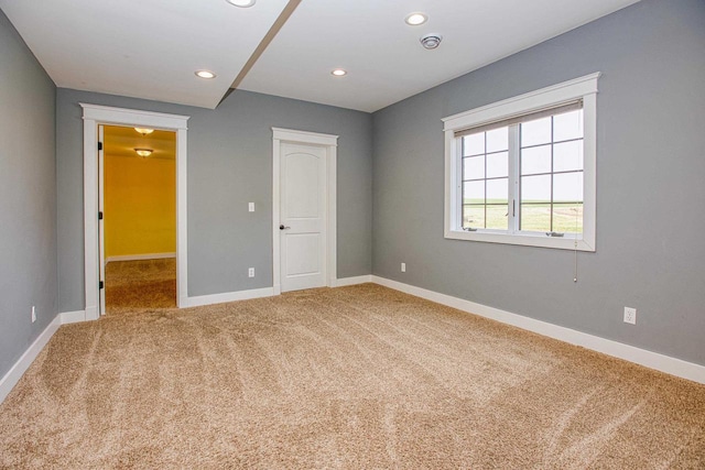 unfurnished bedroom with carpet flooring