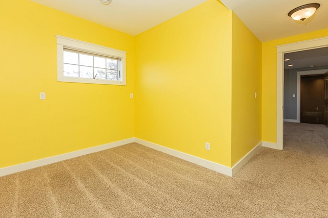 empty room with carpet flooring