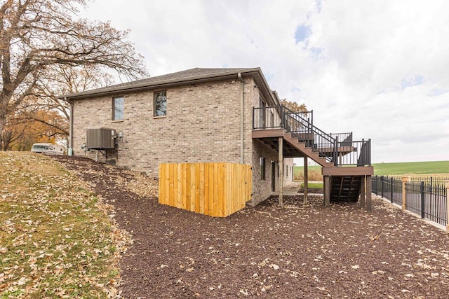 view of property exterior featuring a deck