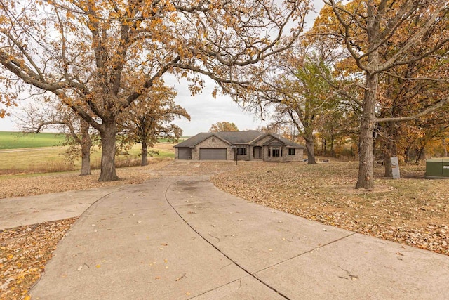 single story home featuring a garage