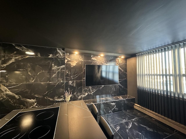 bathroom with marble finish floor