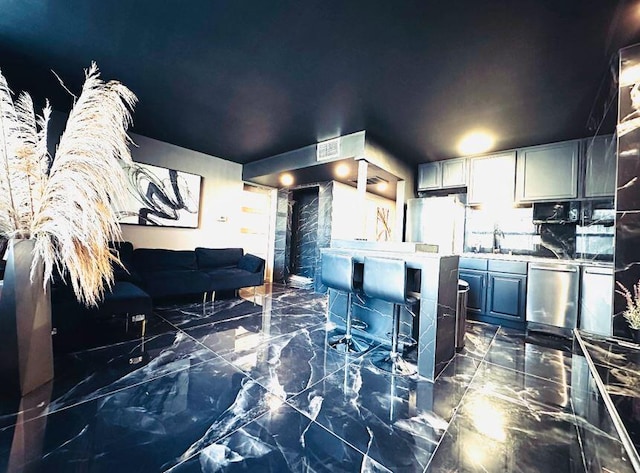 kitchen featuring sink, dishwasher, fridge, and tasteful backsplash