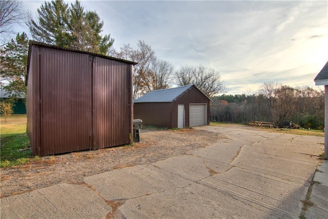 view of outbuilding featuring a garage