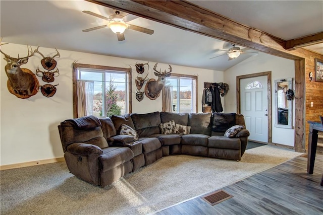 living room featuring vaulted ceiling with beams, hardwood / wood-style flooring, and ceiling fan