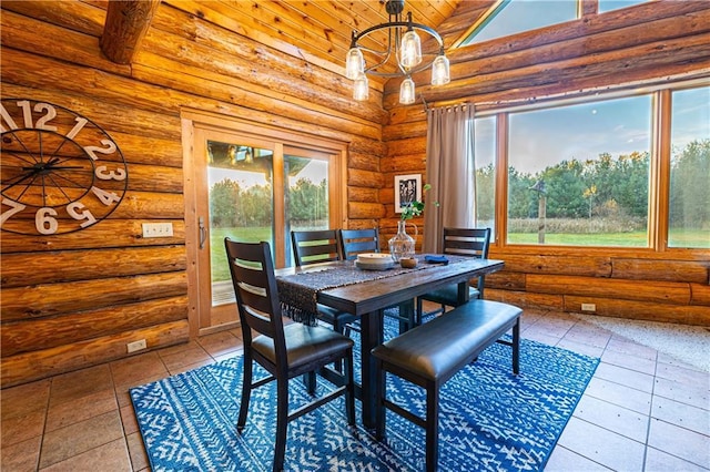 2374 320th St, Clear Lake, WI 54005 - dining space featuring wood ceiling, tile patterned floors, log walls, and a notable chandelier
