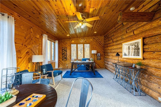 interior space featuring wood ceiling, carpet flooring, and ceiling fan