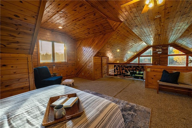 bedroom with wood walls, carpet flooring, wooden ceiling, and vaulted ceiling