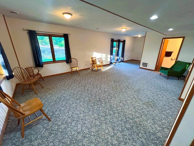 6848 Moonlight Cir, Sun Prairie, WI 53590 - living area featuring carpet, healthy amount of natural light, baseboards, and recessed lighting