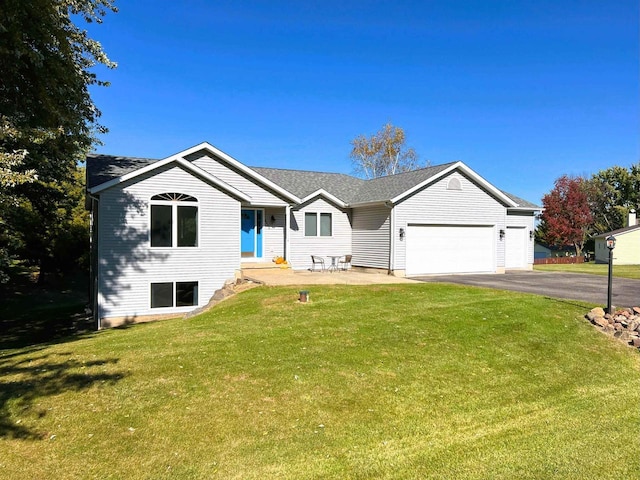 6848 Moonlight Cir, Sun Prairie, WI 53590 - ranch-style house featuring a garage, driveway, and a front lawn