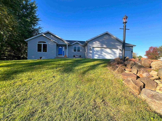 ranch-style house with a front lawn and a garage