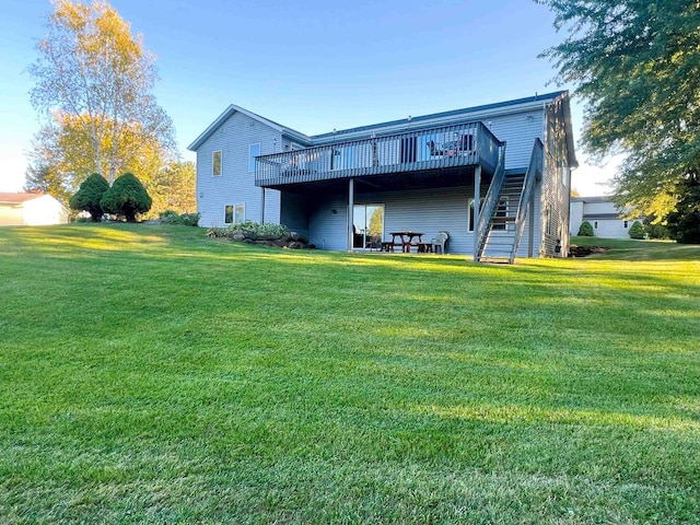 back of house with a deck and a lawn