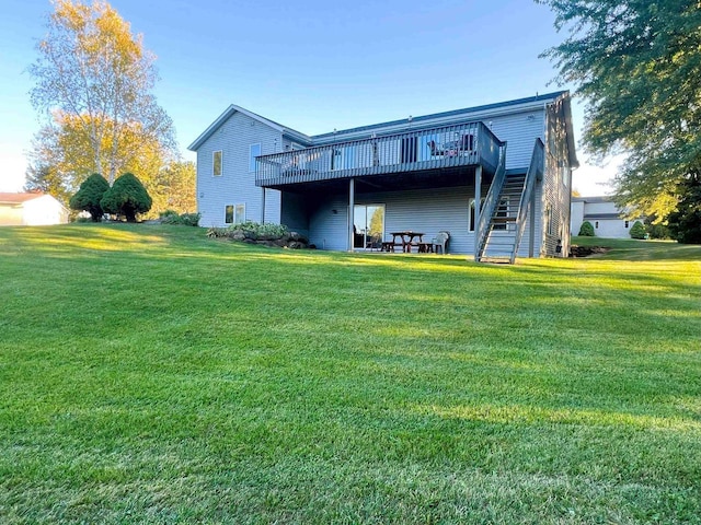 6848 Moonlight Cir, Sun Prairie, WI 53590 - back of house featuring a deck and a lawn
