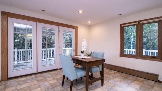 dining room featuring baseboard heating