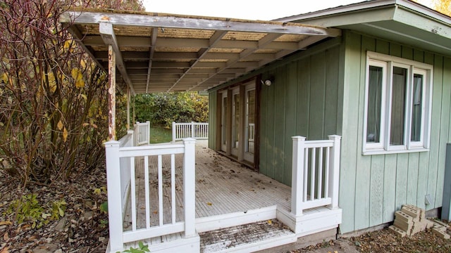 view of property exterior with a deck