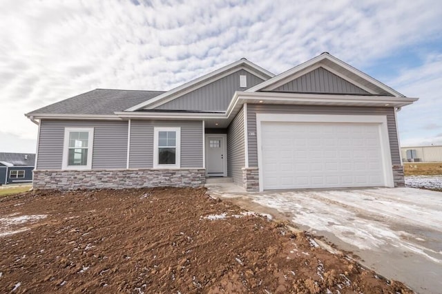 craftsman-style home with a garage