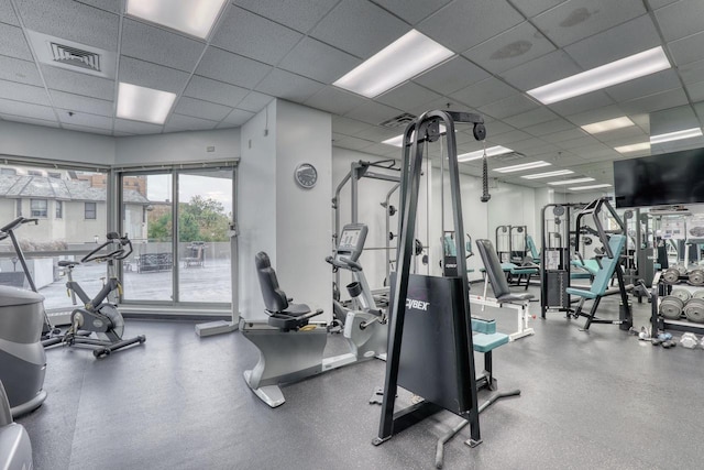 gym with a drop ceiling