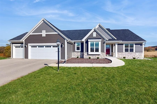 craftsman-style house with a front yard and a garage