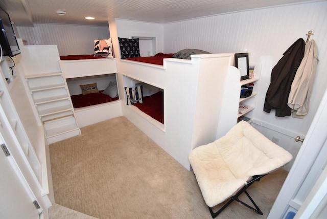 bedroom featuring light colored carpet