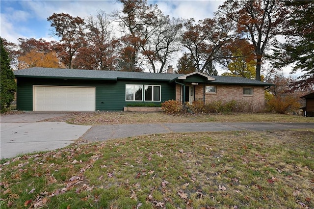 ranch-style home with a garage