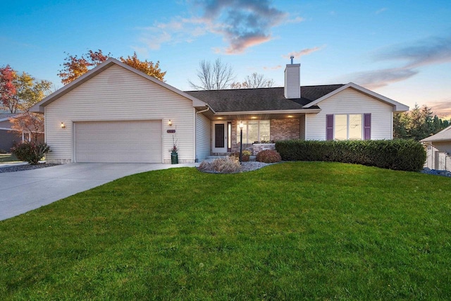 single story home with a yard and a garage