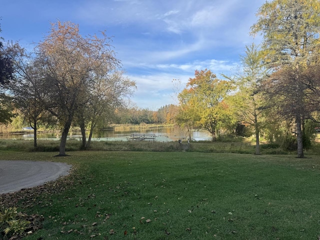 view of yard with a water view