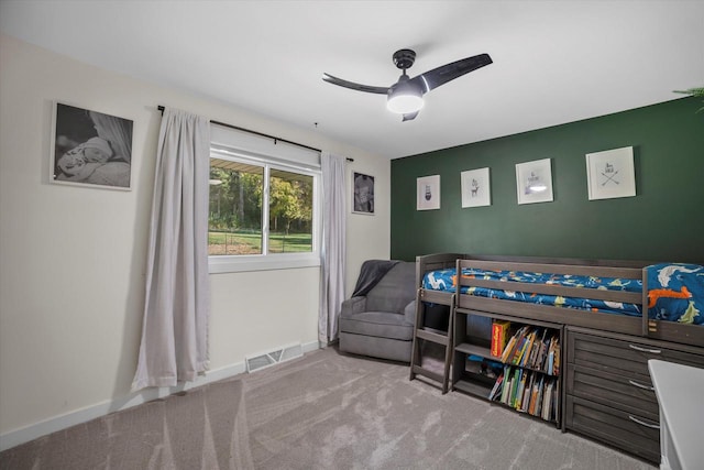 carpeted bedroom featuring ceiling fan