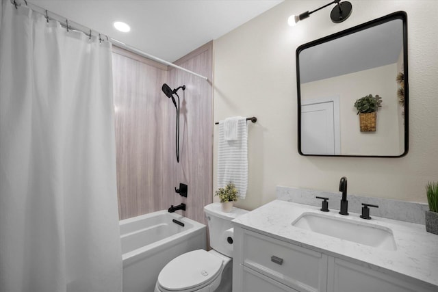 full bathroom with vanity, toilet, and shower / tub combo with curtain