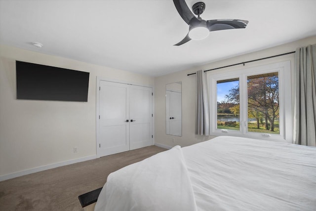 bedroom featuring a closet, ceiling fan, and carpet floors