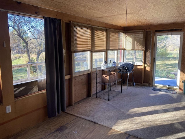 sunroom with wooden ceiling