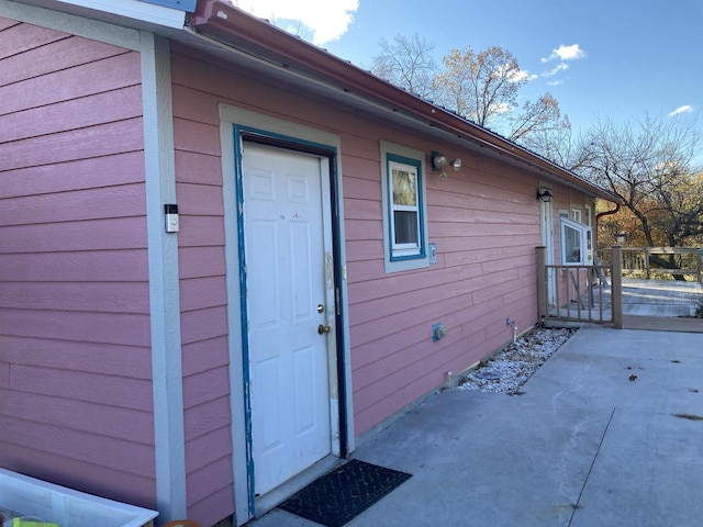 view of property exterior featuring a patio area