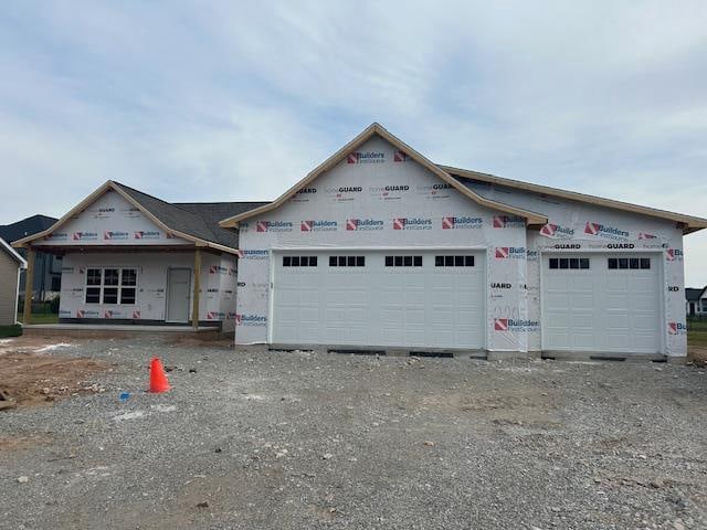 property under construction featuring a garage