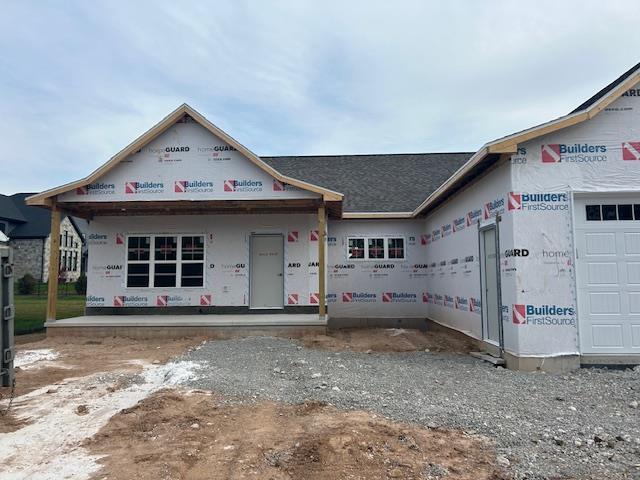 property under construction with a garage