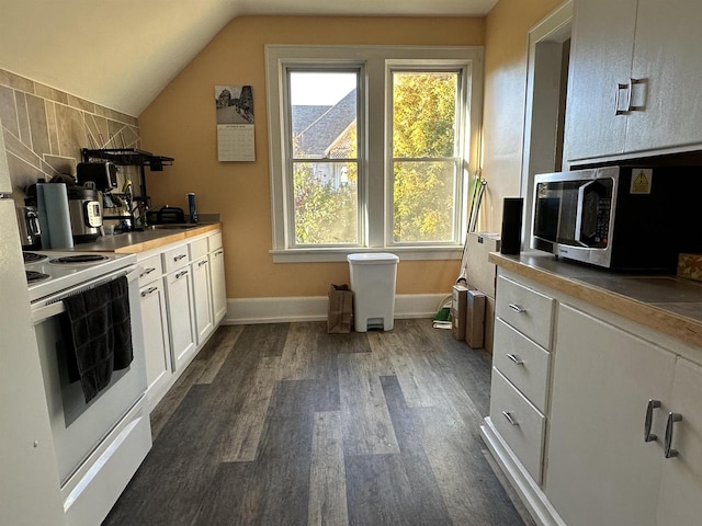 kitchen with sink, white cabinetry, lofted ceiling, dark wood-type flooring, and white electric range oven