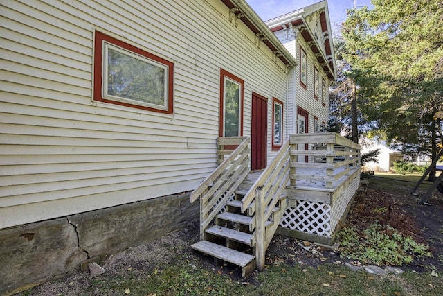 view of home's exterior with a deck