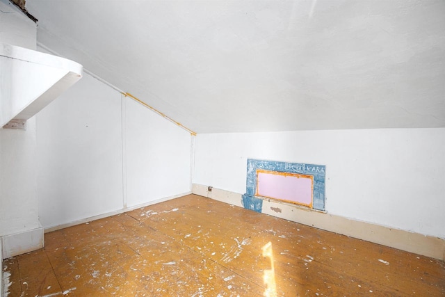 bonus room with vaulted ceiling