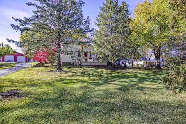 view of yard with a garage