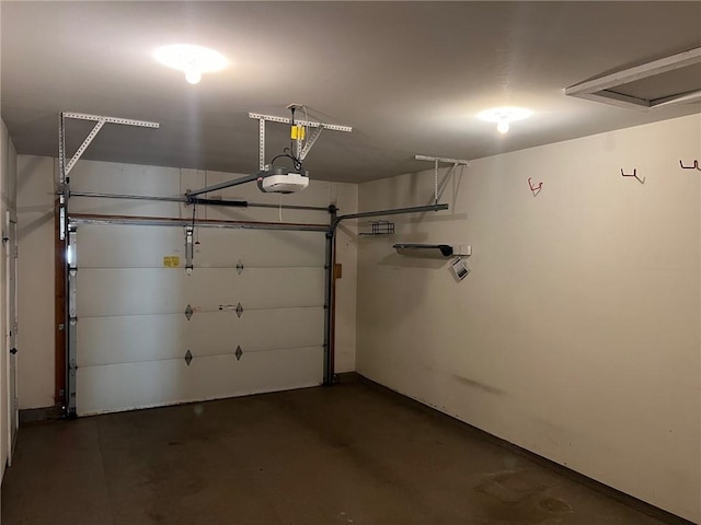 garage featuring a garage door opener