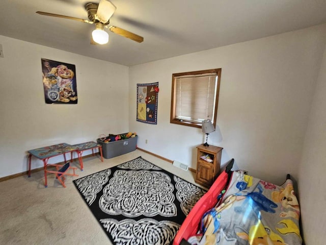 bedroom featuring visible vents, ceiling fan, baseboards, and carpet floors