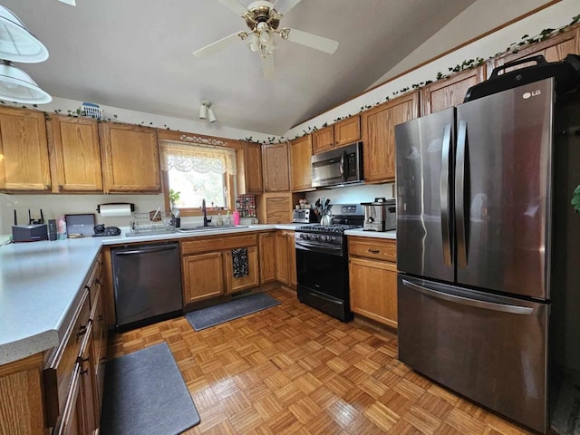 kitchen featuring light parquet flooring, black appliances, sink, ceiling fan, and vaulted ceiling