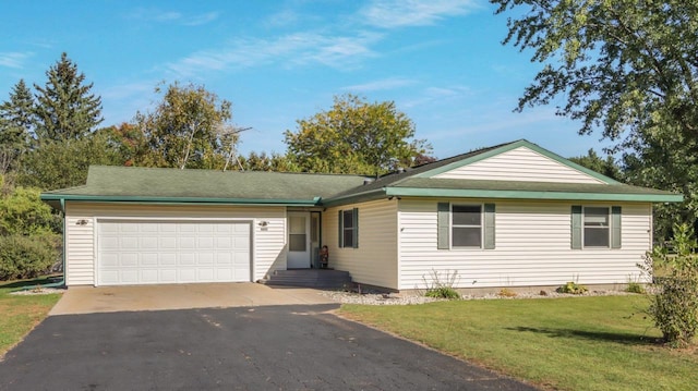 ranch-style house with a front lawn and a garage