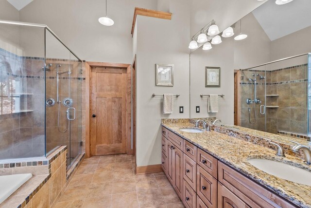 bathroom with vanity, high vaulted ceiling, separate shower and tub, and tile patterned flooring