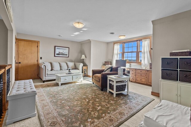 living room featuring light colored carpet