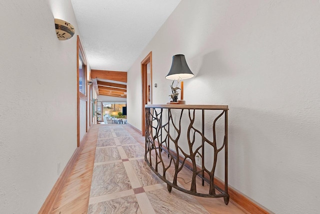 corridor with light hardwood / wood-style flooring